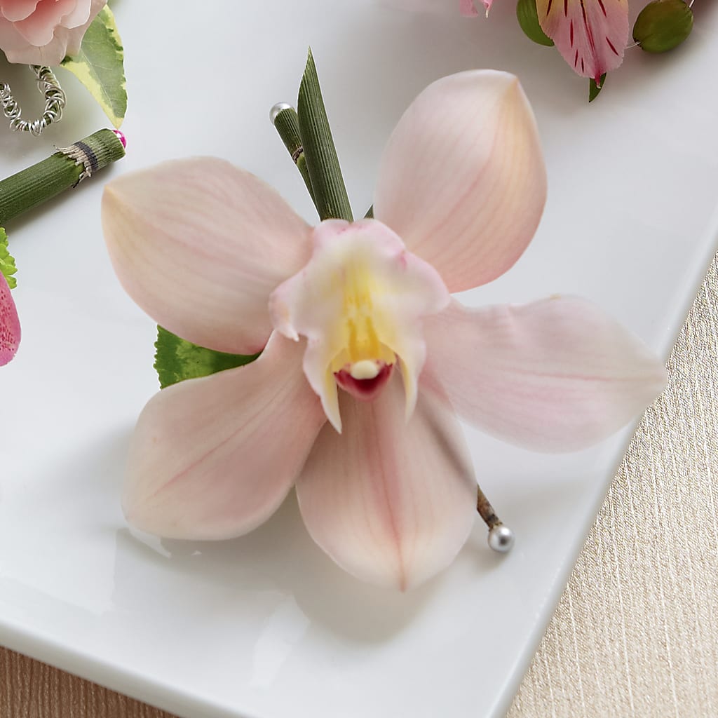 Pink Cymbidium Boutonniere – Hurst Florist, Callahan FL