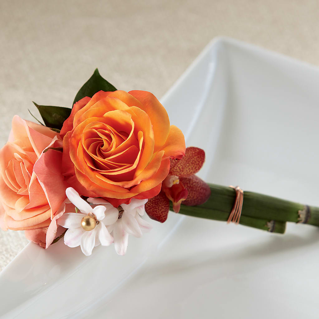 Sunset Dream Boutonniere – Hurst Florist, Callahan FL